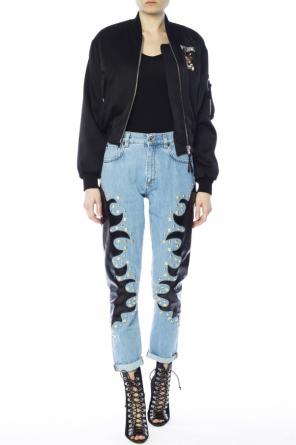Jeansy wysadzane ćwiekami, zdjęcie 2 Jeansy wysadzane ćwiekami od Moschino